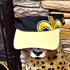 NFL Store. Saints Fleur De Lis Black and Gold. NWOT Visor. Adjustable.